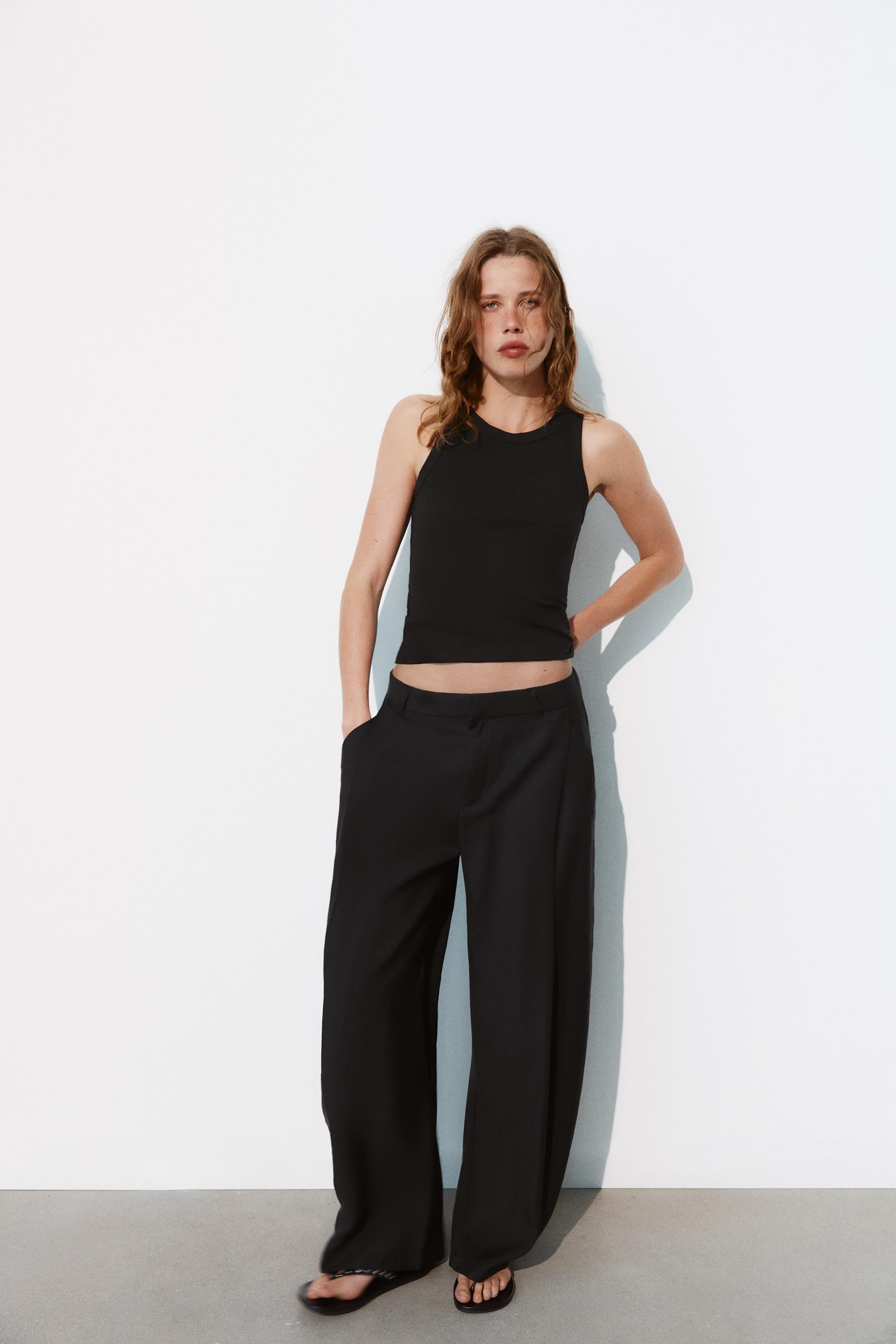 FLOWY STRIPED PLEATED PANTS